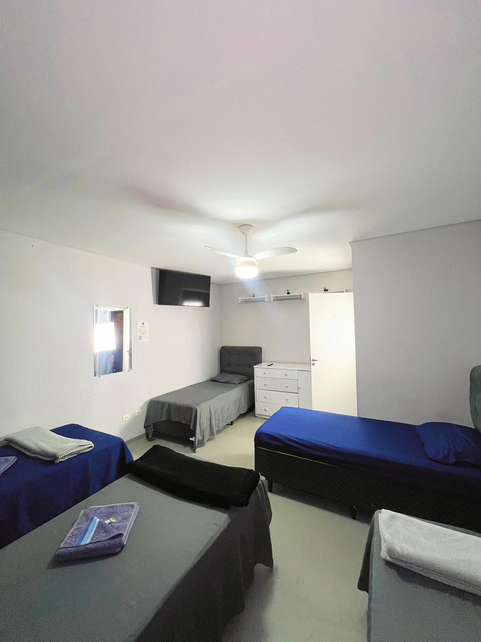 Quarto compartilhado com camas individuais